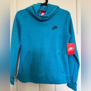 Brand new Girls Nike tech fleece in size medium